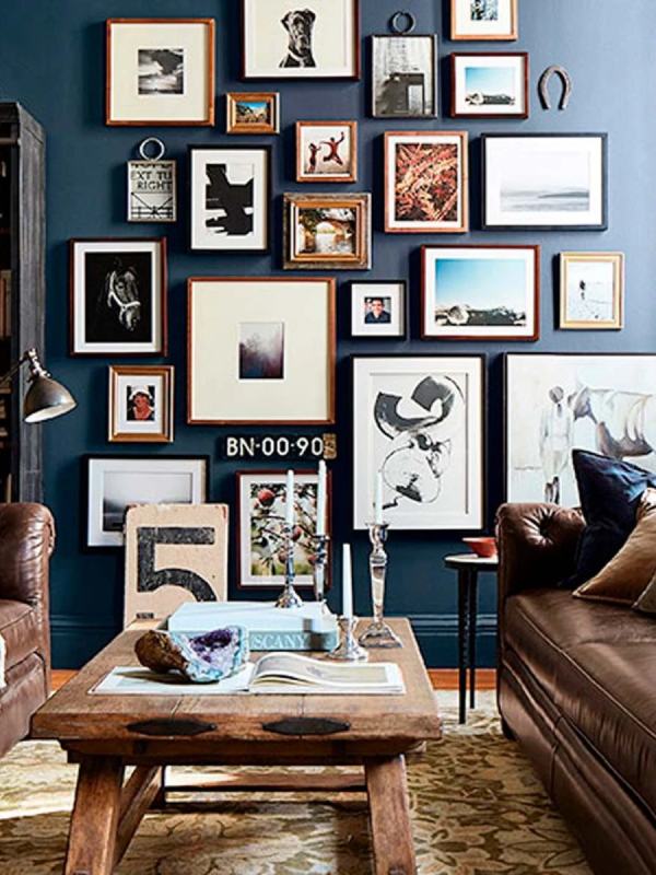 Tall walls can be decor with large-scale artwork and creating a gallery wall