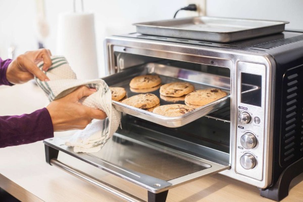 Toaster Ovens are versatile as they can bake, broil, reheat food, and roast chicken and vegetable